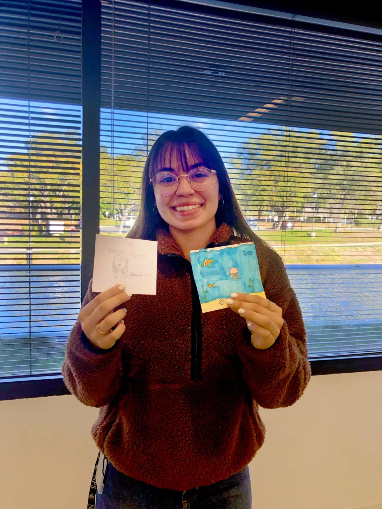 girl holding a paper